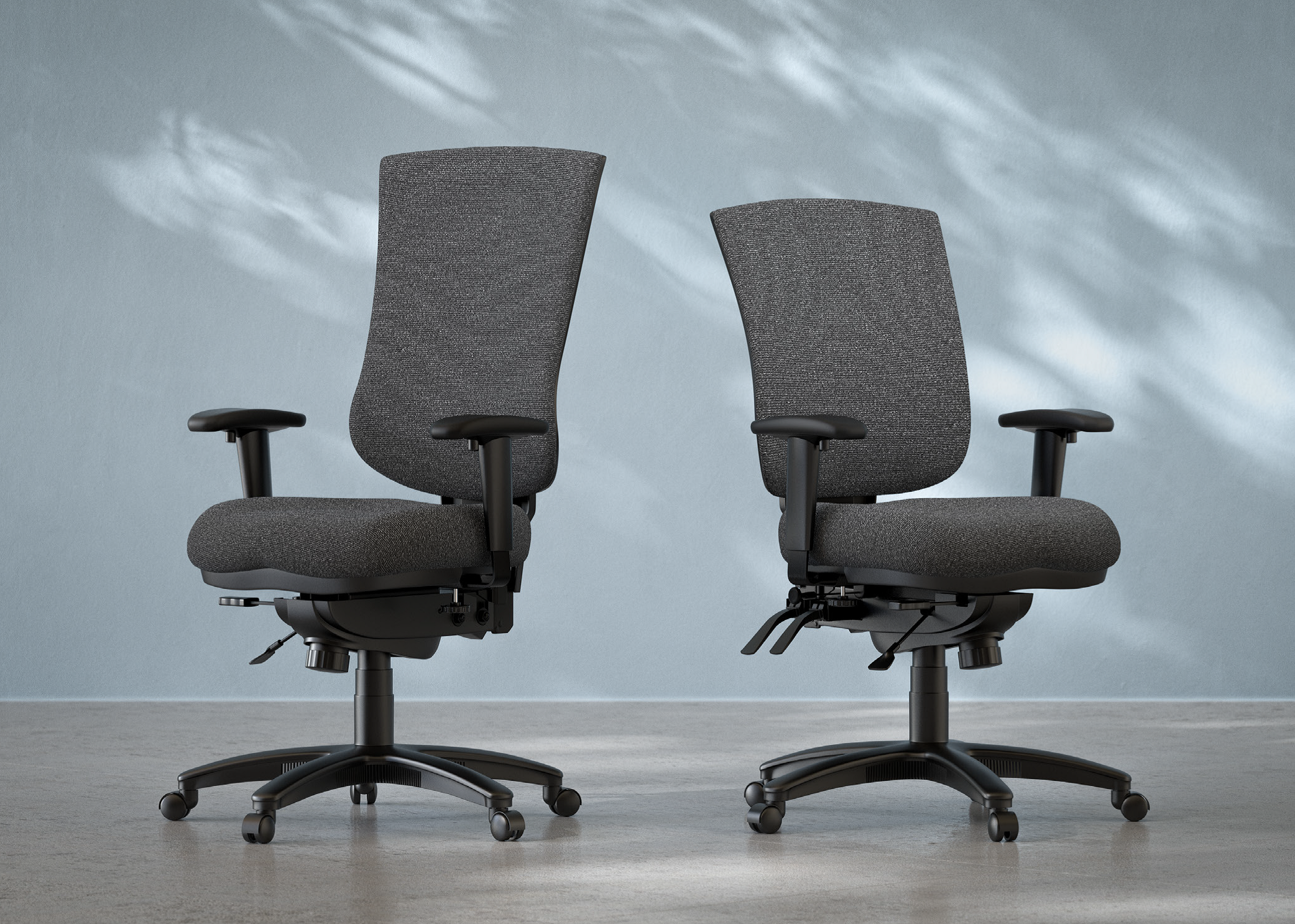 Pair of ergonomic office chairs for a professional workspace